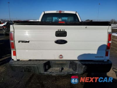 Zdjęcie 6 z 12 samochodu: 2014 FORD F150 VIN:1FTMF1CM4EKD62977 - miniatura