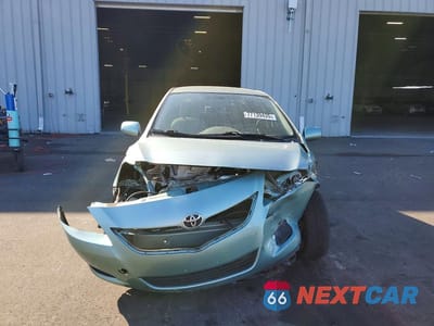 Piąte zdjęcie samochodu w środku: 2010 TOYOTA YARIS VIN:JTDBT4K32A1369274 - miniatura