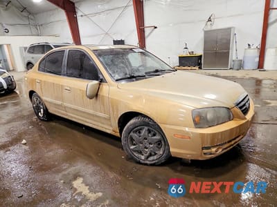 Czwarte zdjęcie samochodu z boku: 2004 HYUNDAI ELANTRA GLS VIN:KMHDN46D14U745290 - miniatura
