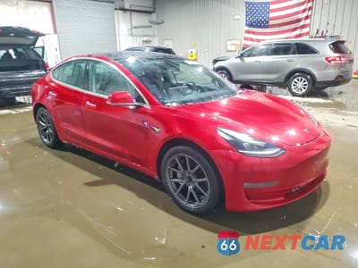 Czwarte zdjęcie samochodu z boku: 2020 TESLA MODEL 3 VIN:5YJ3E1EB1LF664201 - miniatura
