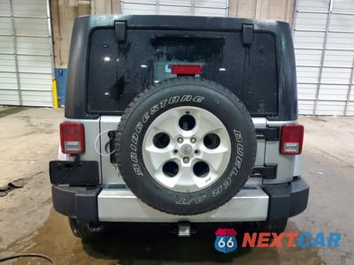 Zdjęcie 6 z 12 samochodu: 2013 JEEP WRANGLER UNLIMITED SAHARA VIN:1C4BJWEG0DL560796 - miniatura