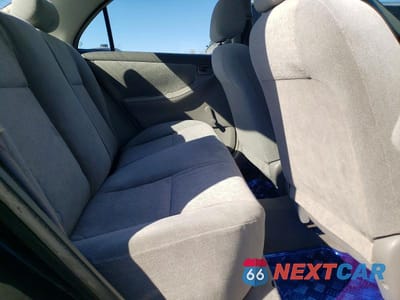 Zdjęcie 10 z 11 samochodu: 2003 TOYOTA COROLLA CE VIN:JTDBR32E330028694 - miniatura