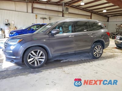 2017 HONDA PILOT TOURING 5FNYF6H94HB032910 - główne zdjęcie licytacji z USA - miniatura
