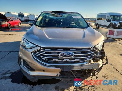 Piąte zdjęcie samochodu w środku: 2021 FORD EDGE TITANIUM VIN:2FMPK4K96MBA27182 - miniatura
