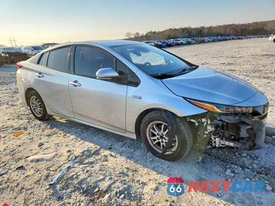 Czwarte zdjęcie samochodu z boku: 2018 TOYOTA PRIUS PRIME VIN:JTDKARFP7J3087264 - miniatura