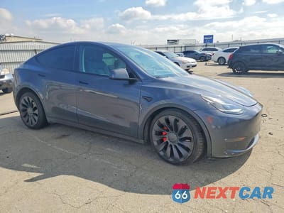 Czwarte zdjęcie samochodu z boku: 2022 TESLA MODEL Y VIN:7SAYGDEFXNF443819 - miniatura