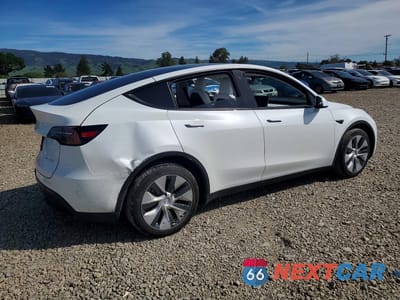 Trzecie zdjęcie samochodu z tyłu: 2023 TESLA MODEL Y VIN:7SAYGDEE3PF670991 - miniatura