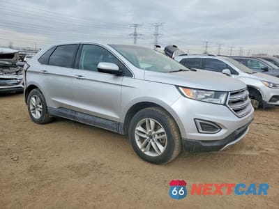 Czwarte zdjęcie samochodu z boku: 2015 FORD EDGE SEL VIN:2FMTK4J87FBB65744 - miniatura