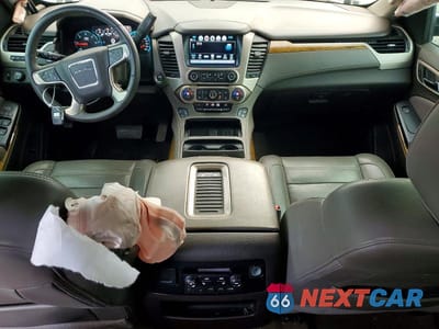 Zdjęcie 8 z 12 samochodu: 2017 GMC YUKON DENALI VIN:1GKS2CKJXHR211244 - miniatura