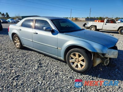 Czwarte zdjęcie samochodu z boku: 2006 CHRYSLER 300 TOURING VIN:2C3LA53G96H299349 - miniatura