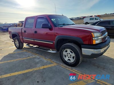 Czwarte zdjęcie samochodu z boku: 2004 CHEVROLET SILVERADO K1500 VIN:2GCEK13T141411526 - miniatura