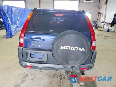 Zdjęcie 6 z 12 samochodu: 2004 HONDA CR-V LX VIN:JHLRD78414C053163 - miniatura