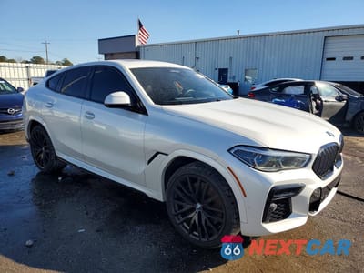 Czwarte zdjęcie samochodu z boku: 2022 BMW X6 M50I VIN:5UXCY8C09N9K63623 - miniatura