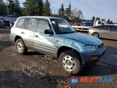 Czwarte zdjęcie samochodu z boku: 1997 TOYOTA RAV4 VIN:JT3HP10V5V0148768 - miniatura