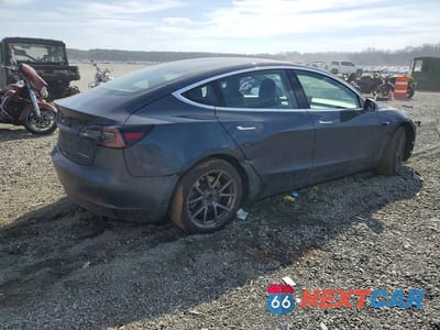 Trzecie zdjęcie samochodu z tyłu: 2018 TESLA MODEL 3 VIN:5YJ3E1EB1JF066543 - miniatura