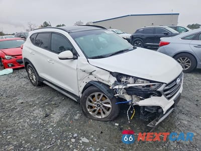 Czwarte zdjęcie samochodu z boku: 2017 HYUNDAI TUCSON LIMITED VIN:KM8J3CA24HU567602 - miniatura