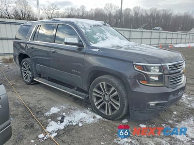 Czwarte zdjęcie samochodu z boku: 2015 CHEVROLET TAHOE K1500 LTZ VIN:1GNSKCKC1FR602140 - miniatura