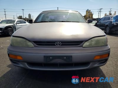 Piąte zdjęcie samochodu w środku: 1995 TOYOTA CAMRY LE V6 VIN:4T1GK12E1SU081332 - miniatura