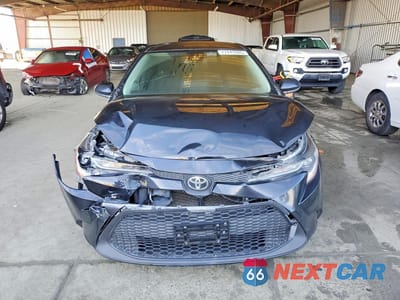 Piąte zdjęcie samochodu w środku: 2021 TOYOTA COROLLA LE VIN:JTDEPMAE5MJ180921 - miniatura
