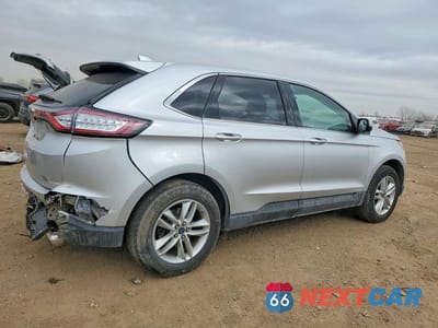 Trzecie zdjęcie samochodu z tyłu: 2015 FORD EDGE SEL VIN:2FMTK4J87FBB65744 - miniatura