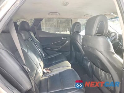 Zdjęcie 11 z 12 samochodu: 2014 HYUNDAI SANTA FE SPORT 2.0T VIN:5XYZU3LA3EG210126 - miniatura