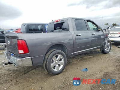 Trzecie zdjęcie samochodu z tyłu: 2015 RAM 1500 SLT VIN:1C6RR6LM9FS629663 - miniatura