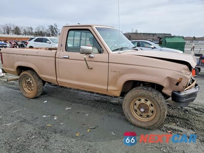 Czwarte zdjęcie samochodu z boku: 1987 FORD RANGER VIN:1FTCR11AXHUA91458 - miniatura