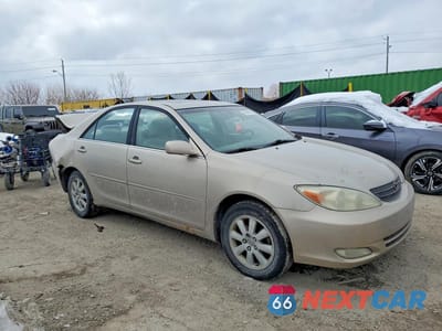 Czwarte zdjęcie samochodu z boku: 2003 TOYOTA CAMRY LE VIN:4T1BE30K03U739195 - miniatura
