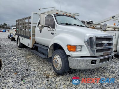 Czwarte zdjęcie samochodu z boku: 2006 FORD F650 SUPER DUTY FLATBED TRUCK VIN:3FRWX66H36V269019 - miniatura