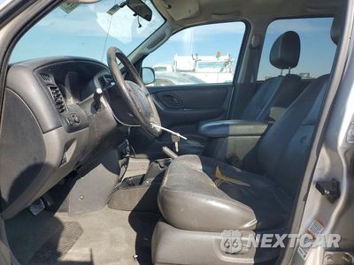 Zdjęcie 7 z 13 samochodu: 2003 MAZDA TRIBUTE VIN:4F2CZ06103KM32258 - miniatura