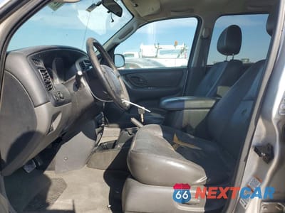 Zdjęcie 7 z 13 samochodu: 2003 MAZDA TRIBUTE VIN:4F2CZ06103KM32258 - miniatura