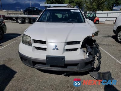 Piąte zdjęcie samochodu w środku: 2003 MITSUBISHI OUTLANDER LS VIN:JA4LX31G33U030039 - miniatura