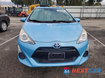 Piąte zdjęcie samochodu w środku: 2015 TOYOTA PRIUS C VIN:JTDKDTB37F1089526 - miniatura