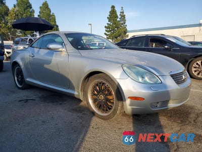 Czwarte zdjęcie samochodu z boku: 2002 LEXUS SC 430 VIN:JTHFN48Y220021799 - miniatura