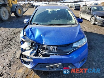 Piąte zdjęcie samochodu w środku: 2016 HONDA FIT EX VIN:JHMGK5H7XGS006828 - miniatura