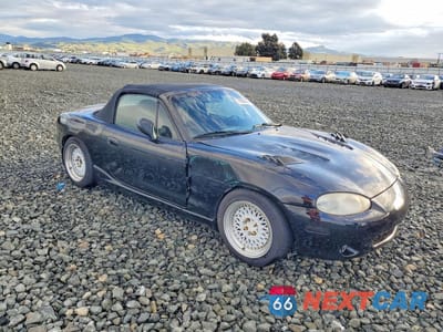 Czwarte zdjęcie samochodu z boku: 1999 MAZDA MX-5 MIATA VIN:JM1NB3537X0109120 - miniatura
