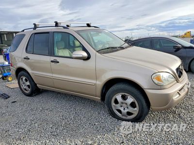 Czwarte zdjęcie samochodu z boku: 2003 MERCEDES BENZ ML VIN:4JGAB57E64A469036 - miniatura