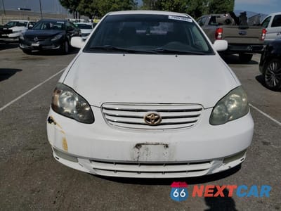 Piąte zdjęcie samochodu w środku: 2003 TOYOTA COROLLA CE VIN:1NXBR32E93Z024136 - miniatura