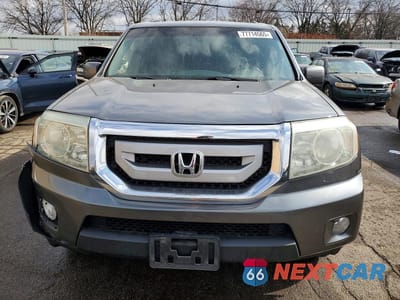 Piąte zdjęcie samochodu w środku: 2011 HONDA PILOT EXL VIN:5FNYF4H5XBB009849 - miniatura