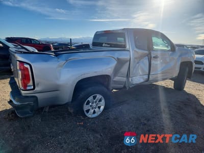 Trzecie zdjęcie samochodu z tyłu: 2018 GMC CANYON VIN:1GTH5BEA0J1218162 - miniatura