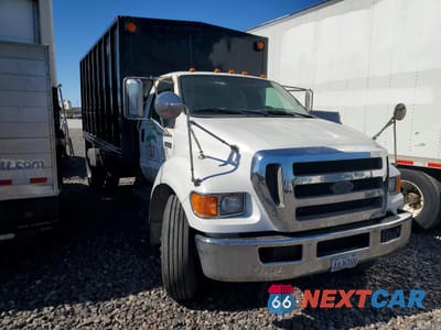 Czwarte zdjęcie samochodu z boku: 2008 FORD F650 SUPER DUTY CHIPPER TRUCK VIN:3FRNF65A08V576623 - miniatura