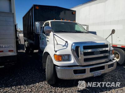Czwarte zdjęcie samochodu z boku: 2008 FORD F650 SUPER DUTY CHIPPER TRUCK VIN:3FRNF65A08V576623 - miniatura