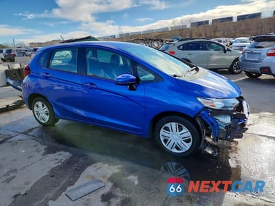 Czwarte zdjęcie samochodu z boku: 2018 HONDA FIT LX VIN:3HGGK5H42JM731140 - miniatura