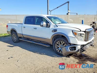 Czwarte zdjęcie samochodu z boku: 2019 NISSAN TITAN XD SL VIN:1N6BA1F46KN519613 - miniatura