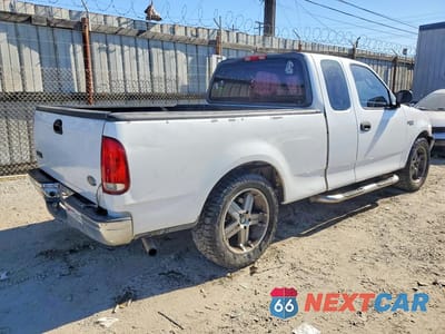 Trzecie zdjęcie samochodu z tyłu: 2003 FORD F150 VIN:1FTRX17223NB92206 - miniatura