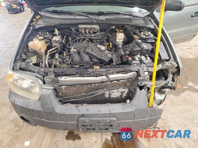 Zdjęcie 12 z 14 samochodu: 2006 FORD ESCAPE XLT VIN:1FMYU03146KC08550 - miniatura