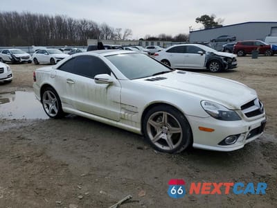 Czwarte zdjęcie samochodu z boku: 2009 MERCEDES-BENZ SL 550 VIN:WDBSK71F29F153373 - miniatura