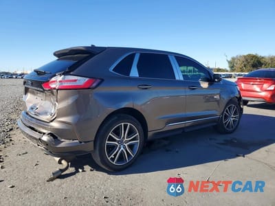 Trzecie zdjęcie samochodu z tyłu: 2019 FORD EDGE TITANIUM VIN:2FMPK4K91KBB20589 - miniatura
