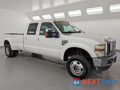 Czwarte zdjęcie samochodu z boku: 2010 FORD F350 SUPER DUTY VIN:1FTWW3DR8AEB28848 - miniatura