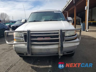 Piąte zdjęcie samochodu w środku: 2001 GMC YUKON XL K1500 VIN:1GKFK16TX1J296933 - miniatura